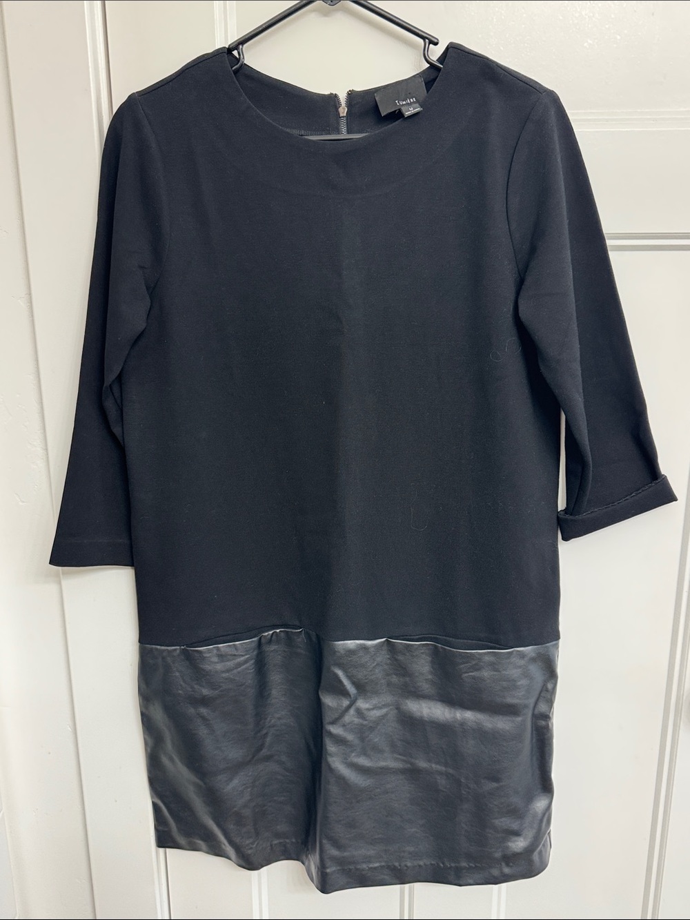 Lush Black Shift Dress with Faux Leather Hem